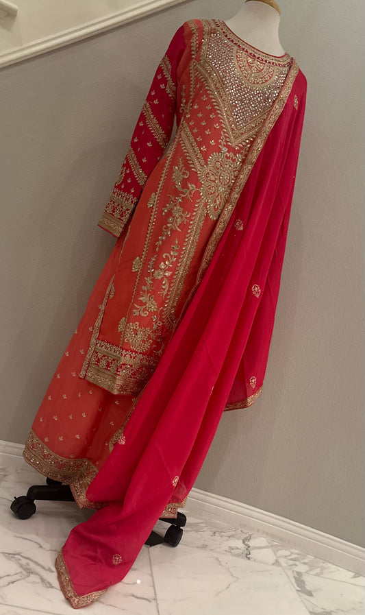 A stirking 3 piece set in Marlyse rose color (salmon color) palazzo set with contrasting hot pink dupatta. Crafted in the ever gorgeous chinon material with heavy embroidery and real mirror work all over. 

This marlyse rose is sure to make one’s heart flutter. 

Size available: 42

Can be preordered in any size from 40-46. Please use contact us page or the chat function to inquire about pre-order availability and process 